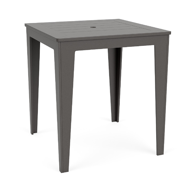 Three-quarter perspective view of a 36-inch square MGP outdoor bar-height table in a uniform dark grey finish, featuring a slatted tabletop with a central umbrella hole.