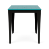 Straight-on front view of a 36-inch square marine-grade polymer (MGP) outdoor bar-height table featuring a bright Aruba teal slatted top with a centered umbrella hole, set on a contrasting solid black frame and tapered legs.