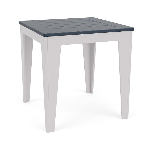 Three-quarter perspective view of a 30-inch square MGP outdoor dining-height table featuring a navy blue slatted top set on a clean white frame with tapered legs.