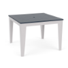 Three-quarter perspective view of a 42-inch square MGP outdoor dining-height table featuring a navy blue slatted top with a centered umbrella hole, set on a white frame with tapered legs.