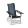 Three-quarter perspective view of a modern MGP outdoor Adirondack chair featuring a navy blue seat, armrest tops, and straight back slats, set against a contrasting solid white frame and leg base.