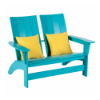 Three-quarter perspective view of a two-seat marine-grade polymer (MGP) modern outdoor Adirondack loveseat in a solid bright Aruba teal finish, accented with two bright yellow square throw pillows.