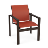 Three-quarter perspective view of an Urban stackable aluminum sling club outdoor dining chair featuring a dark bronze-finish frame, clean-lined armrests, and a rust-red woven sling seat and back, isolated on a white background.