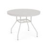 Eye-level perspective view of a 36-inch round Sundance commercial aluminum dining table finished in Sky White powder coat, showcasing a smooth solid aluminum tabletop, splayed legs, lower umbrella bracing, and a center umbrella hole.