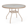 Eye-level perspective view of a 42-inch round Sundance commercial outdoor dining table with a Textured Antique Beige finish, featuring splayed aluminum legs, central umbrella support frame, and a clear textured acrylic top with a middle umbrella hole.