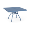 Three-quarter perspective view of a 42-inch square Sundance commercial outdoor dining table in a Steel Blue powder-coat finish, featuring splayed legs, lower umbrella bracing, and a perforated bubble pattern tabletop with a central umbrella opening.