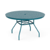 Three-quarter perspective view of a 48-inch round Sundance commercial aluminum outdoor dining table powder-coated in Steel Blue, with splayed legs, lower umbrella bracing, and a perforated bubble pattern tabletop featuring a middle umbrella hole.