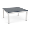 A square outdoor coffee table featuring a dark navy blue slatted MGP top paired with a sky white aluminum frame and four straight legs.