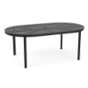 An oval-shaped commercial outdoor aluminum dining table in Starlight Black with a slotted/slat tabletop design and a center umbrella hole.