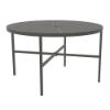 A 48-inch round commercial outdoor aluminum dining table finished in Slate Grey, featuring a sunburst radiant slotted line pattern across the tabletop surface, a central umbrella hole, four straight square legs, and a lower four-spoke cross-brace frame with a central umbrella ring holder.