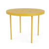 A 20-inch round commercial outdoor aluminum side table finished in bright Yellow, featuring a perforated multi-size bubble hole pattern across the tabletop surface and four straight rounded legs.