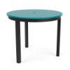 A 36-inch round commercial outdoor dining table featuring a bright teal (Aruba) slat-style Marine Grade Polymer (MGP) tabletop with a center umbrella hole, supported by a Starlight Black powder-coated aluminum frame with four straight square legs and black foot caps.