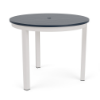 A 36-inch round commercial outdoor dining table featuring a navy blue slat-style Marine Grade Polymer (MGP) tabletop with a center umbrella hole, supported by a Sky White powder-coated aluminum frame with four straight square legs and black foot caps.