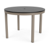 A 42-inch round commercial outdoor dining table featuring a dark grey/black panel-style Marine Grade Polymer (MGP) top with a center umbrella hole, supported by a taupe powder-coated aluminum frame with four straight square legs.