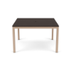 A 48-inch square commercial outdoor dining table featuring a rich dark brown Northeastern Walnut wood-grain panel-style Marine Grade Polymer (MGP) top with a center umbrella hole, supported by a Textured Antique Beige powder-coated aluminum frame.