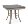 A square commercial outdoor side table featuring a satin taupe-colored aluminum base with flared legs, a circular leg-stabilizing ring, and a smooth Amber Grey MGP top.