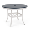 A 36-inch round outdoor dining table built with a Sky White powder-coated aluminum frame, mid-height leg cross-bracing, an umbrella hole, and a Navy blue MGP top.