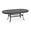 An oval 42x76-inch commercial outdoor dining table in a Starlight Black powder-coated aluminum finish, featuring flared legs, a lower umbrella brace, and a slatted geometric tabletop with a center umbrella hole.