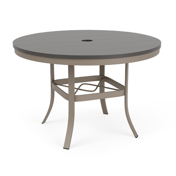 A 42-inch round commercial outdoor dining table with a Satin Amber powder-coated aluminum base, outward-curving legs with an umbrella ring brace, and a slate grey Marine Grade Polymer (MGP) slatted top featuring a center umbrella hole.