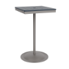 A 24-inch square commercial patio bar table built with a Platinum metallic powder-coated aluminum pedestal base and a weighted circular bottom, featuring a navy blue Marine Grade Polymer (MGP) slatted top with an umbrella opening.