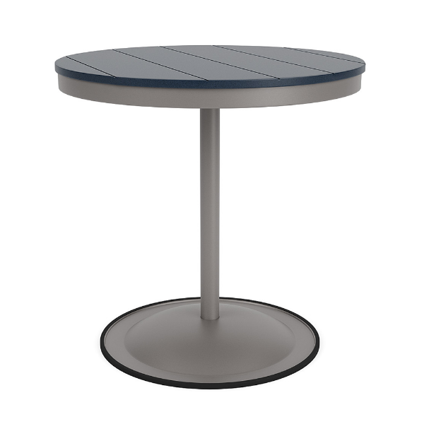 A 30-inch round commercial patio dining table built with a Platinum metallic powder-coated aluminum pedestal base and a circular weighted stand, featuring a navy blue Marine Grade Polymer (MGP) slatted surface.