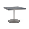 A 36-inch square commercial patio dining table built with a Platinum metallic powder-coated aluminum pedestal base and a circular weighted stand, featuring a navy blue Marine Grade Polymer (MGP) slatted surface with an umbrella hole.