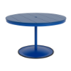 A 48-inch round commercial outdoor dining table featuring a Marina bright blue powder-coated aluminum pedestal post and round weighted footing, paired with a Royal Blue Marine Grade Polymer (MGP) slatted tabletop and a center umbrella opening.