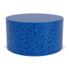 A round, cylindrical commercial outdoor coffee table in Marina blue with an asymmetrical bubble dot pattern cut out across its sides.