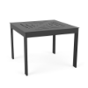 A square aluminum commercial outdoor side table in Starlight Black featuring a concentric square slat pattern cut out on the table top.